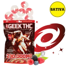 A standing pouch of Lost Geek THC “Swagberry Gummies 230,000 MG .5 lb 8 oz” with a black-and-red astronaut graphic; above the pouch are sugar-coated red-and-white ring gummies; to the right, a red swirl graphic and mixed berries (blackberries, raspberries, blueberries) on melting ice cubes; a yellow circle in the upper right reads “SATIVA.”